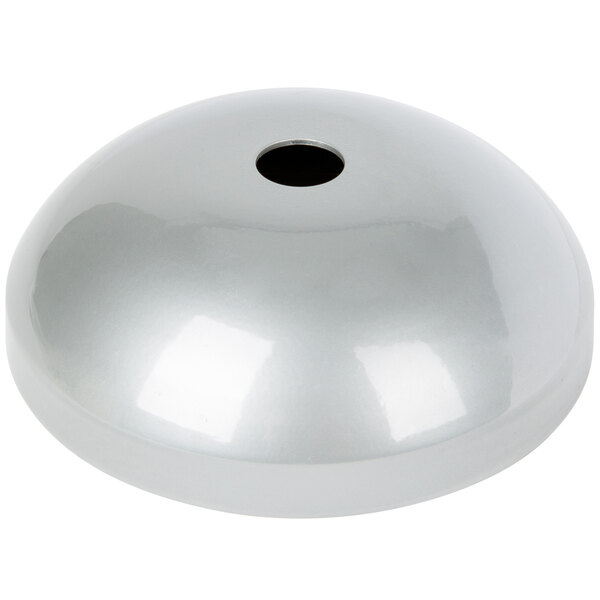 A white metal bowl with a hole in the center.