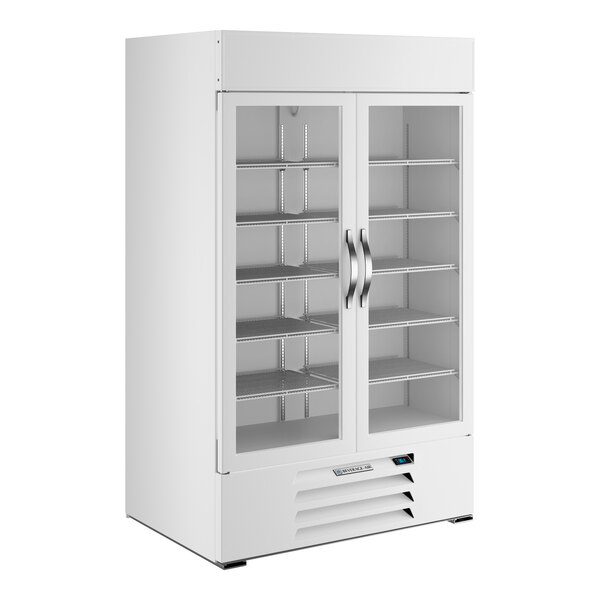 A white two-section glass door merchandiser refrigerator with multiple shelves and stainless steel handles.