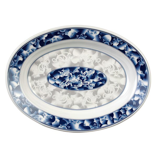 A blue and white Thunder Group Blue Dragon melamine platter with a blue and white dragon design.