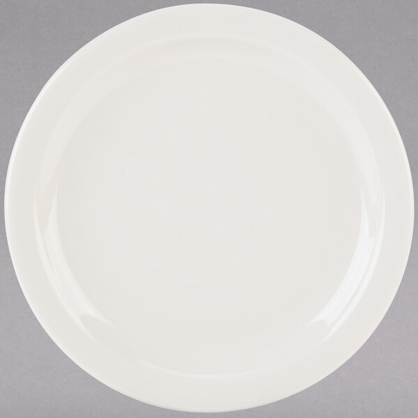 A Tuxton Nevada ivory china plate with a narrow rim on a white background.