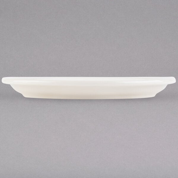 A white Tuxton Nevada narrow rim oval china platter.
