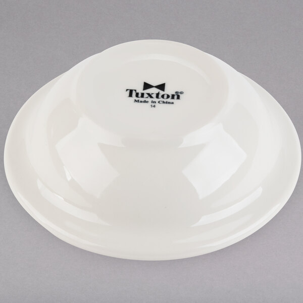 A white Tuxton china bowl with black text reading "Reno / Nevada" on it.