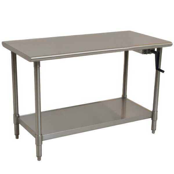 A silver metal Eagle Group stainless steel work table with a shelf.