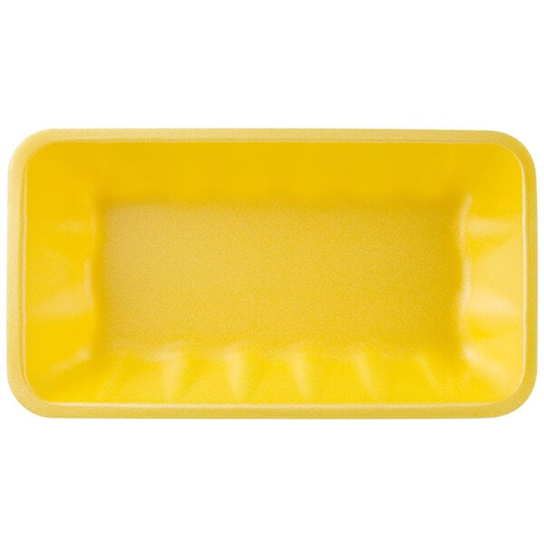 A yellow foam meat tray with white background.