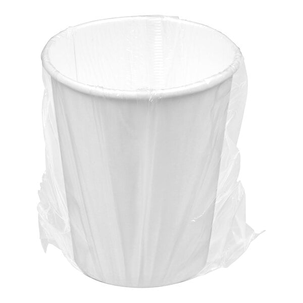 A white paper hot cup with plastic wrap on top.