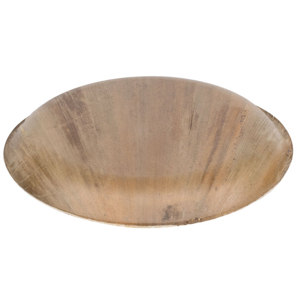 A close-up of a TreeVive by EcoChoice palm leaf plate.