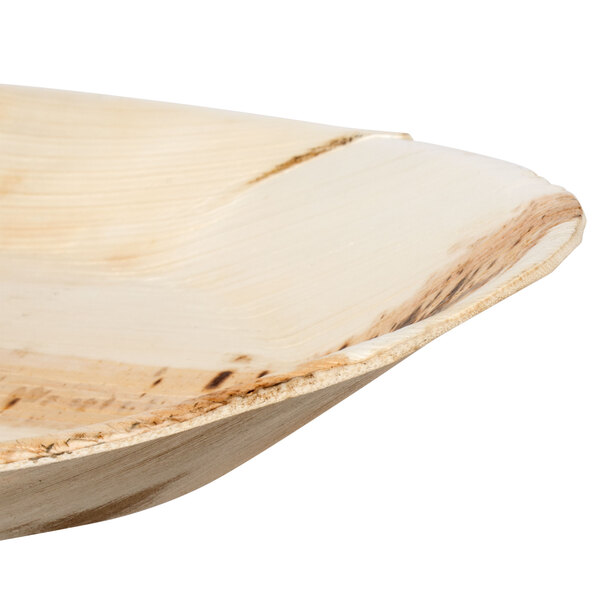 An EcoChoice oval palm leaf salad tray.