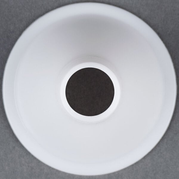 A white Globe #12 stuffing tube with a hole in the center.