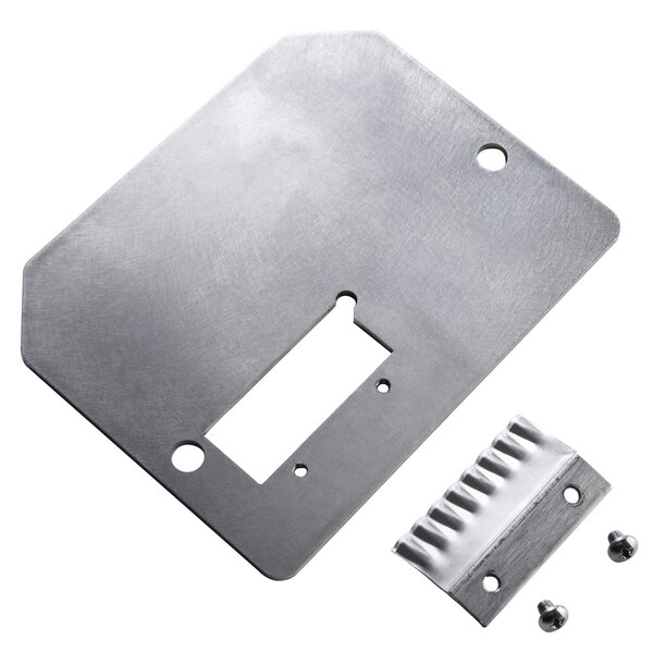 A white metal plate with screws.