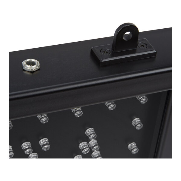 A close-up view of a black frame with a mounting bracket, a metal nut, and several small LED lights arranged in a pattern.