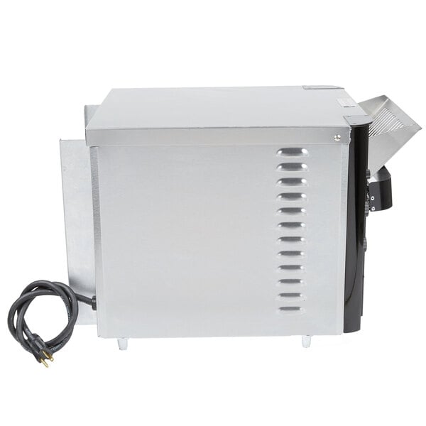 An APW Wyott conveyor toaster machine with a cord.