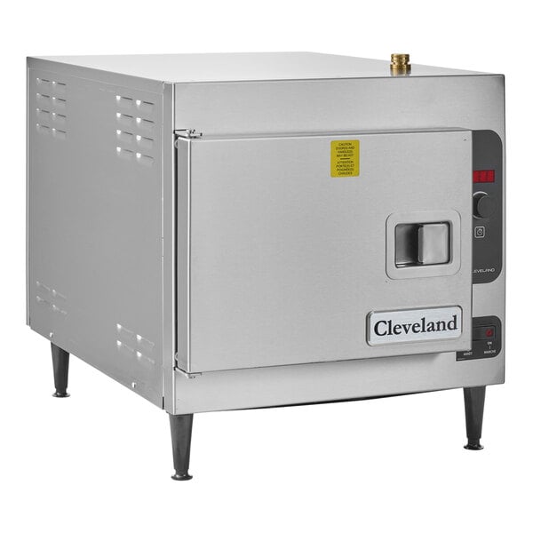 A silver stainless steel Cleveland countertop steamer with a door open.