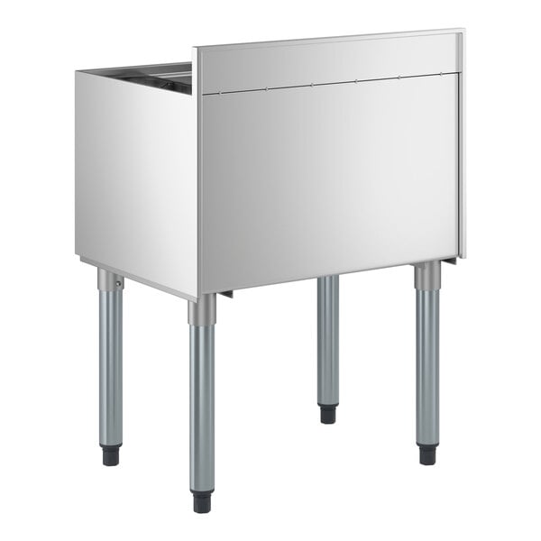 An 18 by 24 inch stainless steel underbar ice bin with bottle holders and four legs.