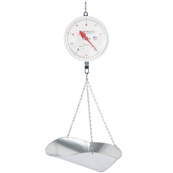 A Cardinal Detecto hanging scoop scale with a chain attached.
