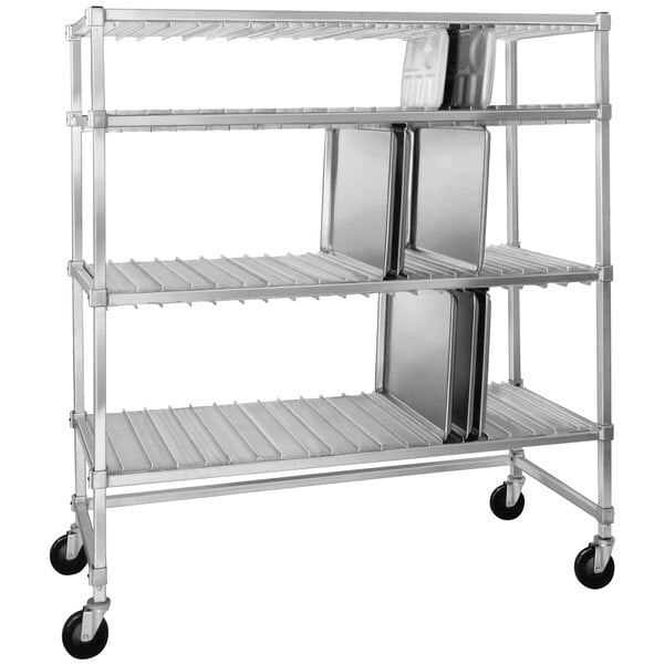 A Channel heavy-duty aluminum tray drying rack with trays on it.