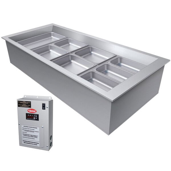 A large rectangular stainless steel Hatco drop-in cold food well with four compartments.