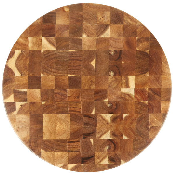 A Tablecraft acacia wood end grain chopping board with a circular pattern of squares.