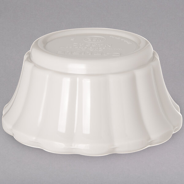 a white bowl with a lid