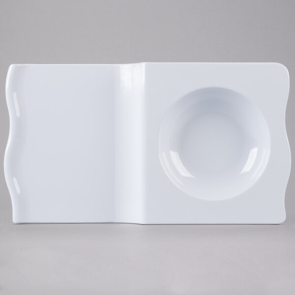 A white GET San Michele Tapas plate with a white border.