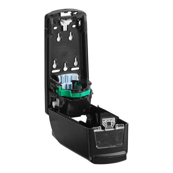 A black plastic Purell dispenser with a green ring inside.