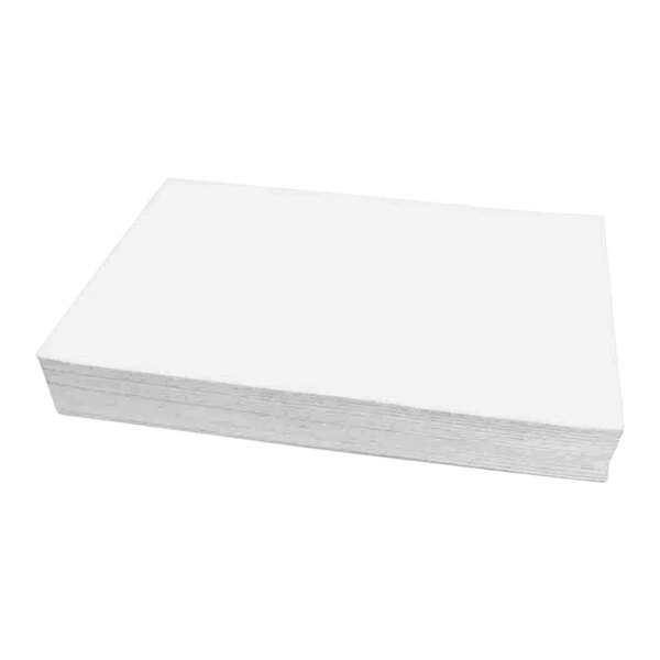 A stack of Pitco heavy-duty flat style filter paper on a white surface.