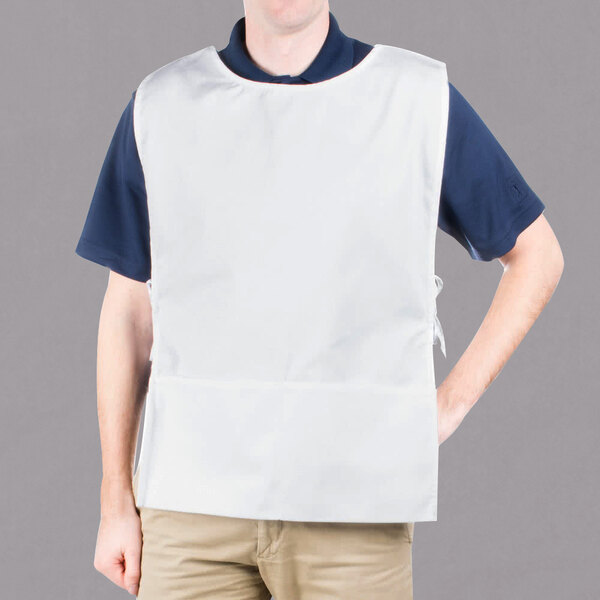 A man wearing a white Intedge cobbler apron.