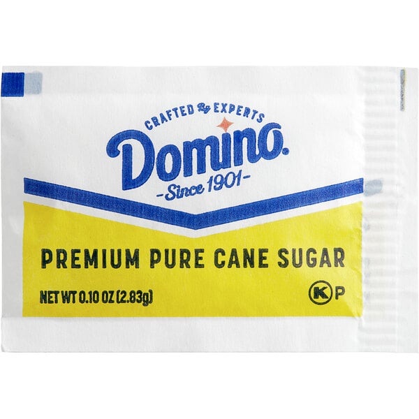 A Domino 2.8 gram sugar packet with blue and yellow text.