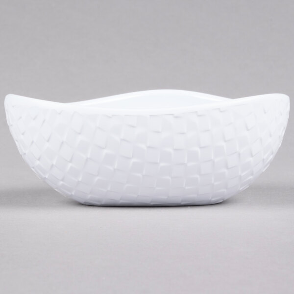 A white GET Coralline melamine triangle bowl with a pattern.