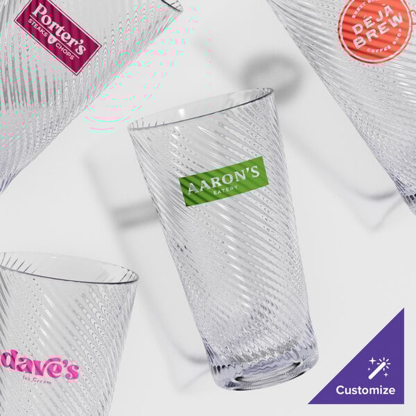 A close-up of a couple of clear GET Tritan plastic tumblers.