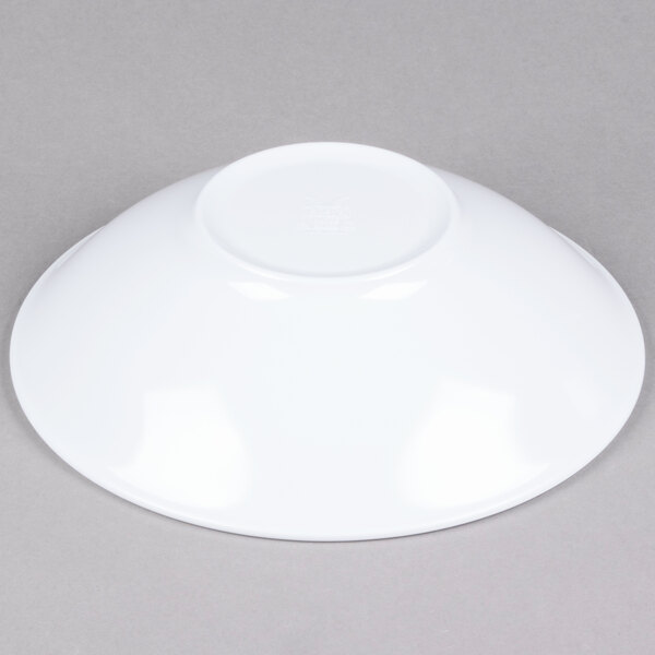 A white GET Milano melamine bowl on a gray surface.