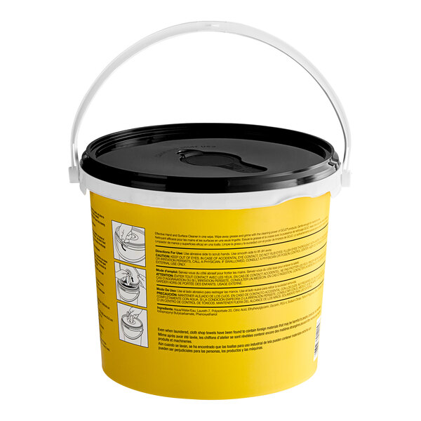A yellow GOJO bucket with a black lid.