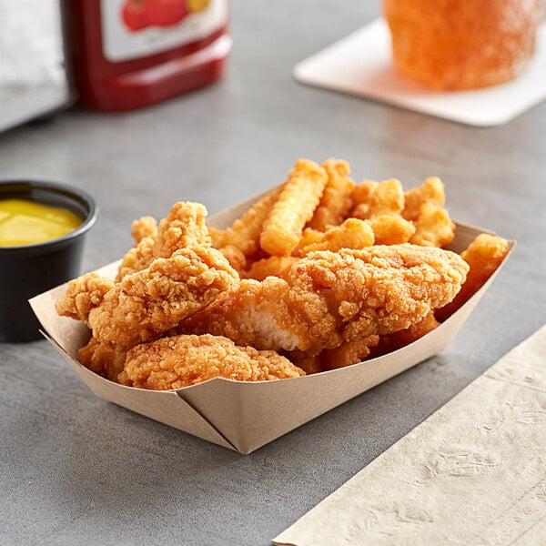 A Bagcraft Packaging EcoCraft paper food tray with fried chicken and fries.