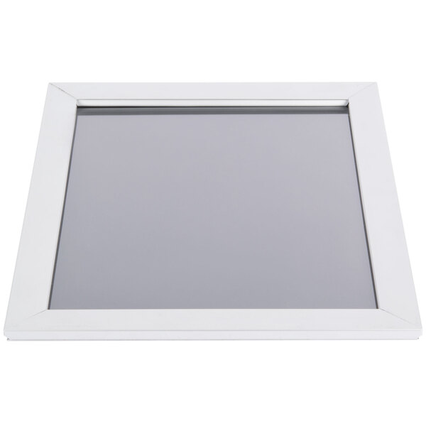A white rectangular window with a satin aluminum frame.