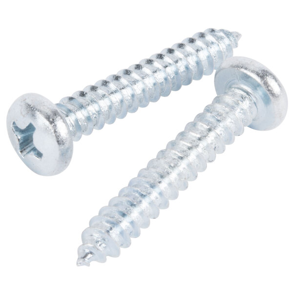 A close-up of two screws being used to secure an Aarco satin aluminum snap frame.