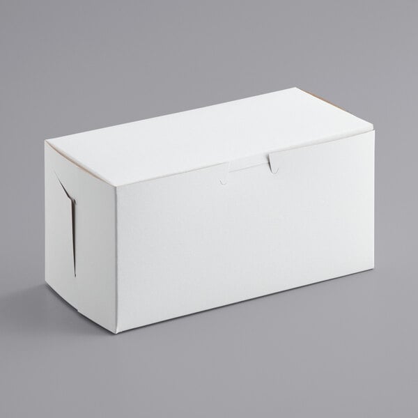 A white 8" x 4" x 4" cupcake box with a lid.