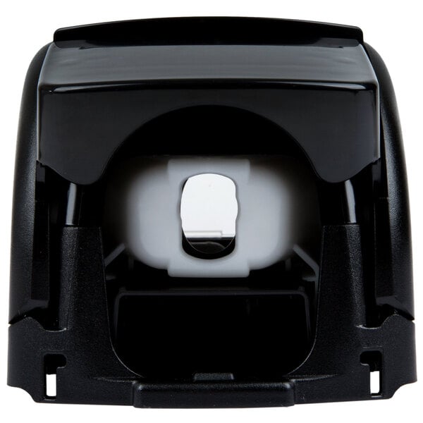 A chrome GOJO soap dispenser.