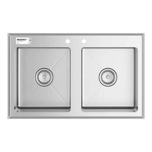 A stainless steel double-basin sink with two drain openings and two faucet holes, viewed from above.