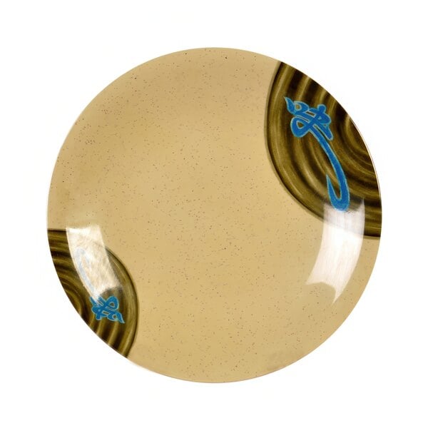 A beige melamine plate with blue designs on it.