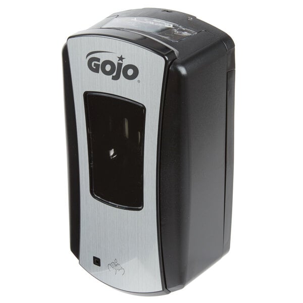 A close-up of a black and silver GOJO® touchless hand soap dispenser.