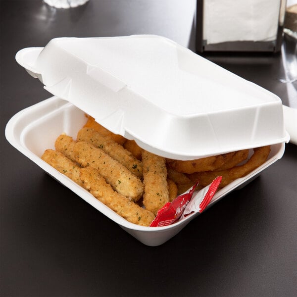 A white Genpak foam container with food in it.