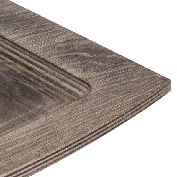 A wooden tray with a wooden border.