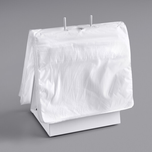 A white plastic Choice Deli saddle bag on a stand.