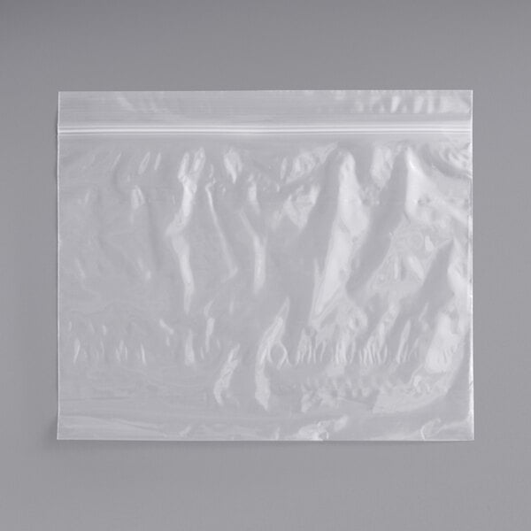 A white plastic Choice Deli saddle bag with a seal top.