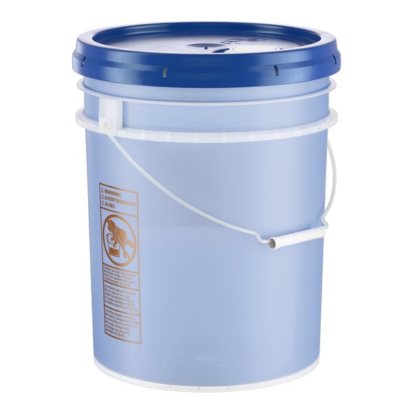 A large blue plastic 5-gallon bucket with a blue lid and white handle, used for holding concentrated liquid dish soap.