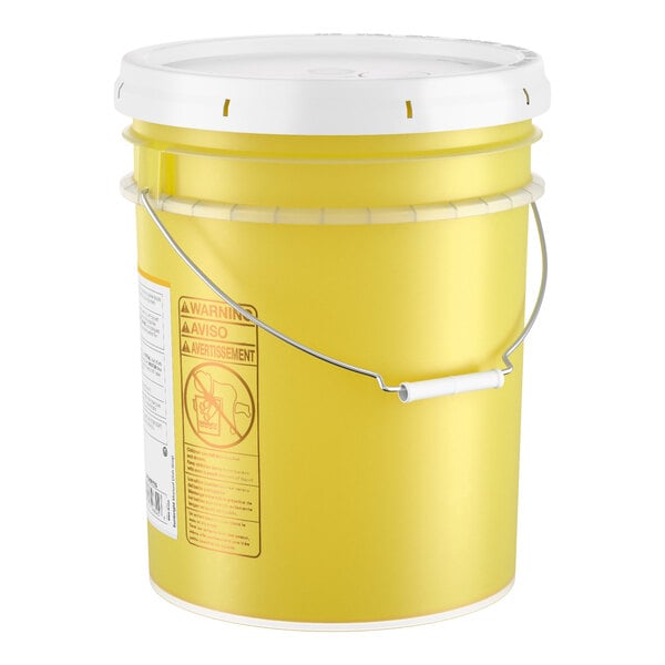 A yellow 5-gallon bucket of Noble Sunbright concentrated liquid dish soap with a white lid and metal handle.