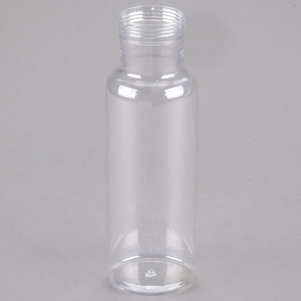 A clear plastic Cal-Mil salad dressing bottle with a clear cap.
