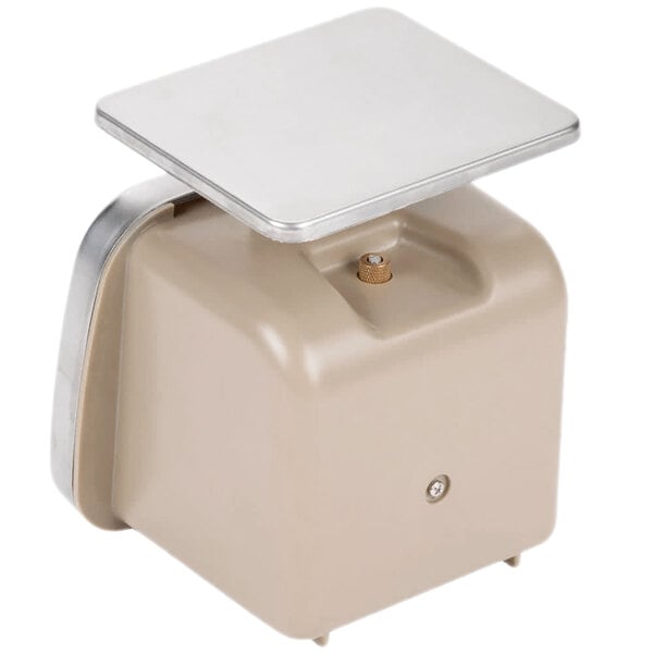 A white square Taylor portion scale with a silver lid.