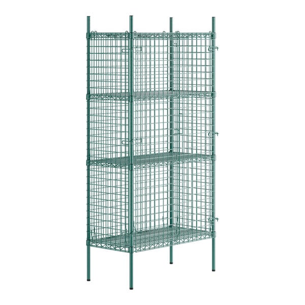 A green wire mesh security cage with three shelves.