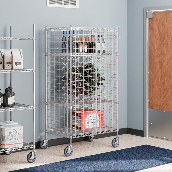 A Regency chrome wire security cage with shelves holding bottles.