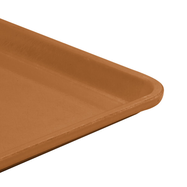 A close up of a brown Cambro dietary tray.